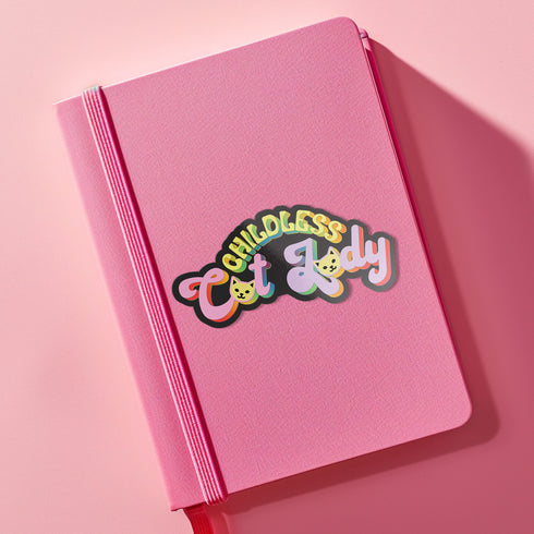 Bold "Childless Cat Lady" sticker with sassy typography and cat silhouettes, embodying feminist political pride.